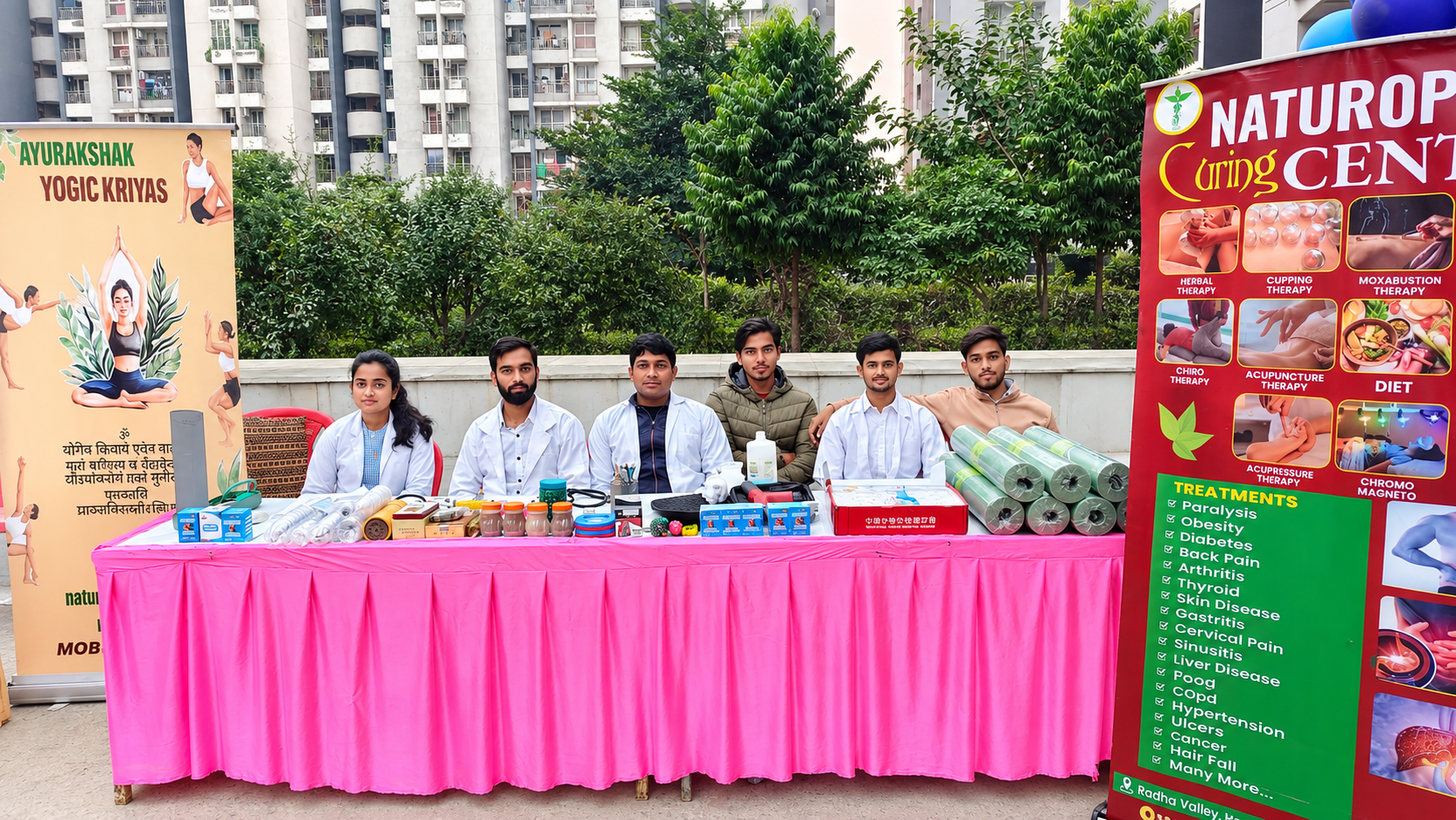 Ayurakshak Association health camp stall with team of doctors and naturopathy displays
